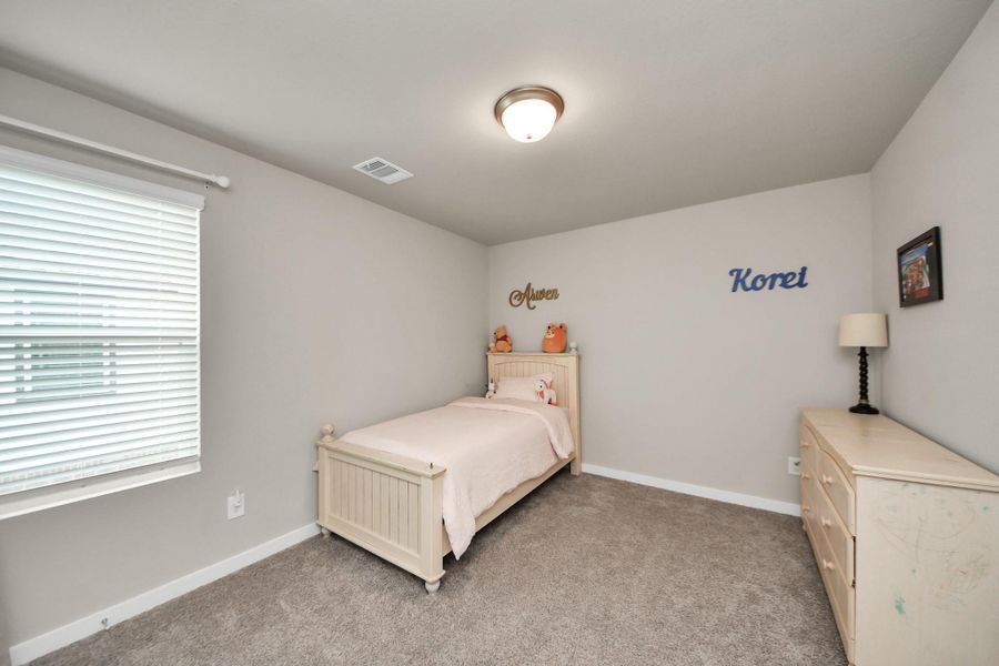 Furnished interior view inside a new home in Heights of Barbers Hill, Baytown (Image 9).