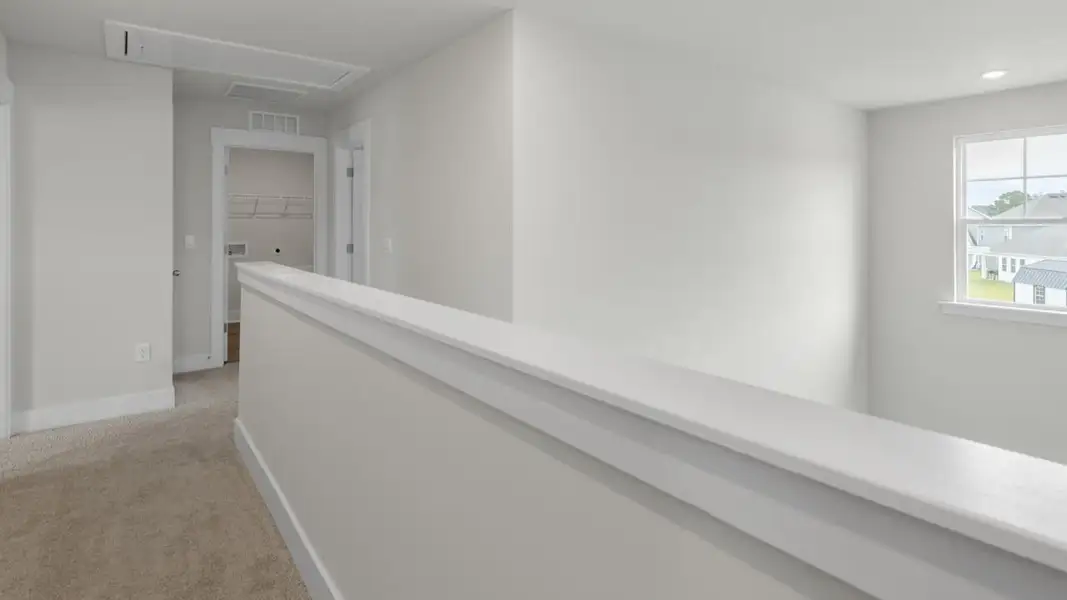 Spacious, unfurnished interior of a new home in The Highlands at Cedar Hill Landing, Navassa (Image 22).