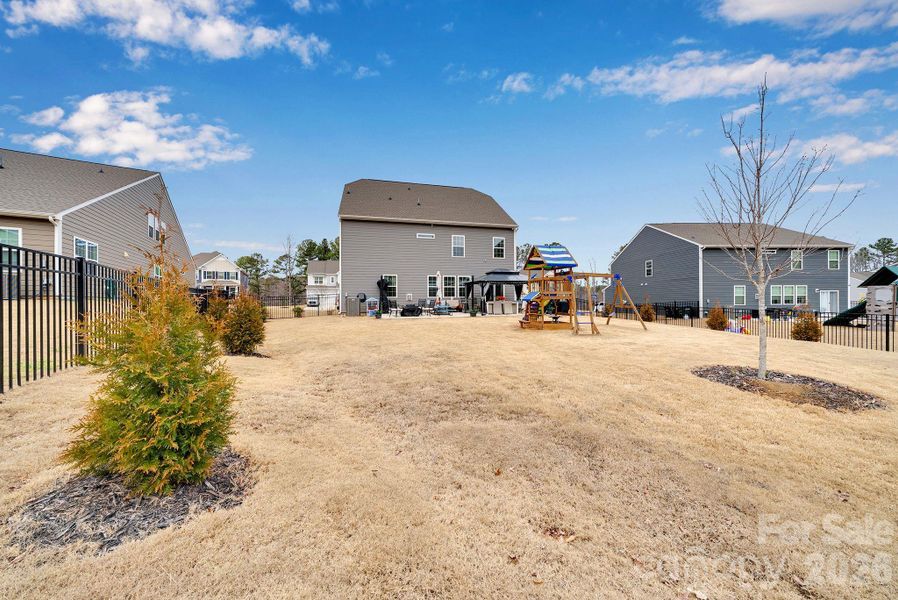Exterior details and patio area of a home in Falls Cove at Lake Norman, Troutman (Image 21).