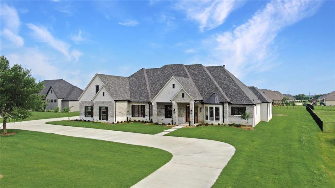 Front exterior of a new home in , Weston, TX, highlighting curb appeal (Image 23).