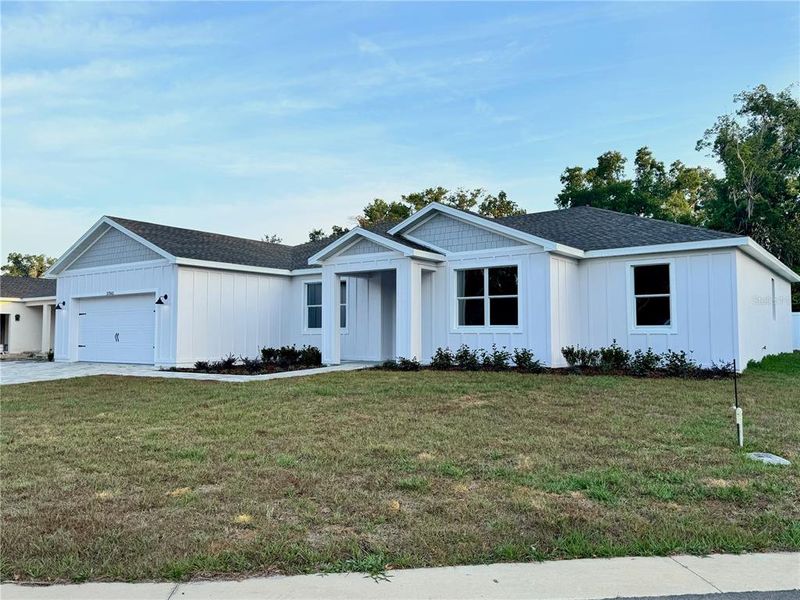 Front exterior of a new home in , Dade City, FL, highlighting curb appeal (Image 1). Front exterior of a new home in , Dade City, FL, highlighting curb appeal (Image 1).