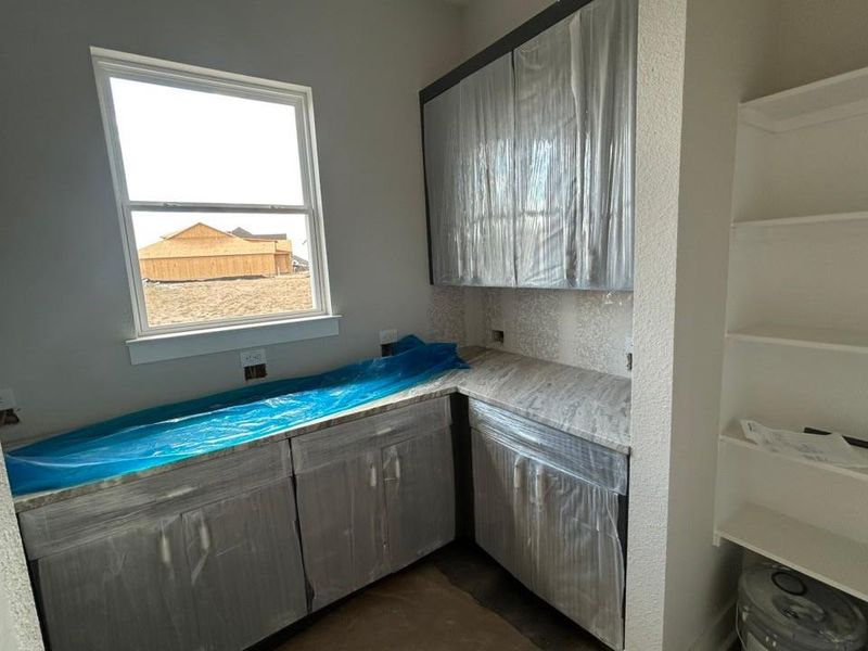 Bar area with tasteful backsplash