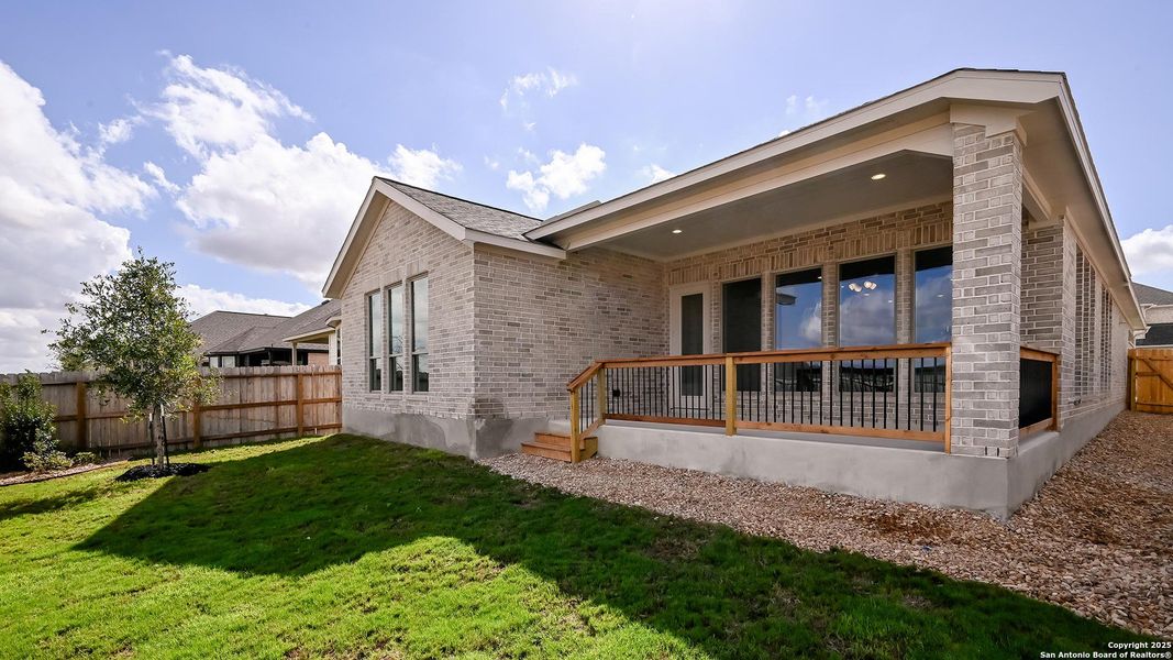 Exterior details and patio area of a home in Legacy At Lake Dunlap 50', New Braunfels (Image 22). Exterior details and patio area of a home in Legacy At Lake Dunlap 50', New Braunfels (Image 22).