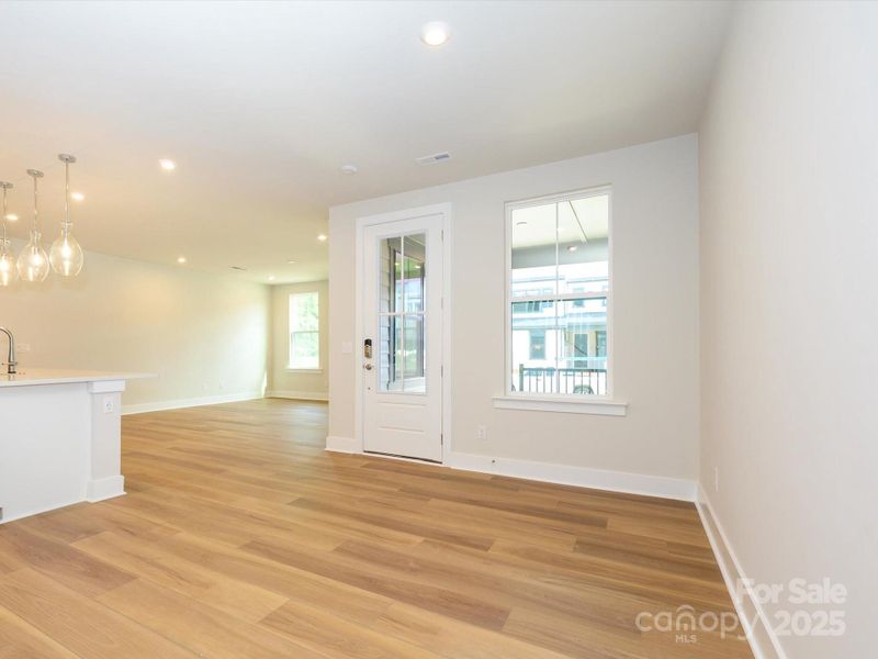 Front Entry Leading to Thoughtfully Placed Dining Area.