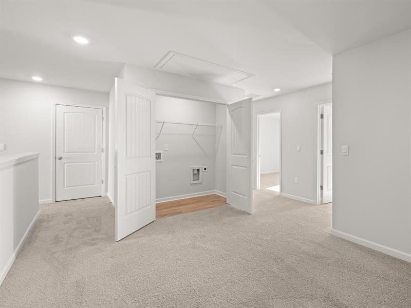 Spacious, unfurnished interior of a new home in Waypoint, Flowery Branch (Image 14).