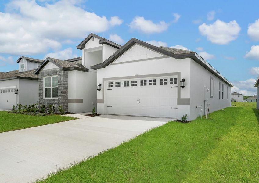 You will love the professional landscaping of the Azalea plan.