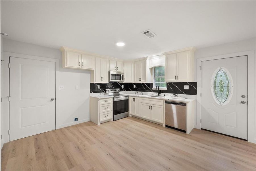 Furnished interior view inside a new home in , Dawson (Image 7).