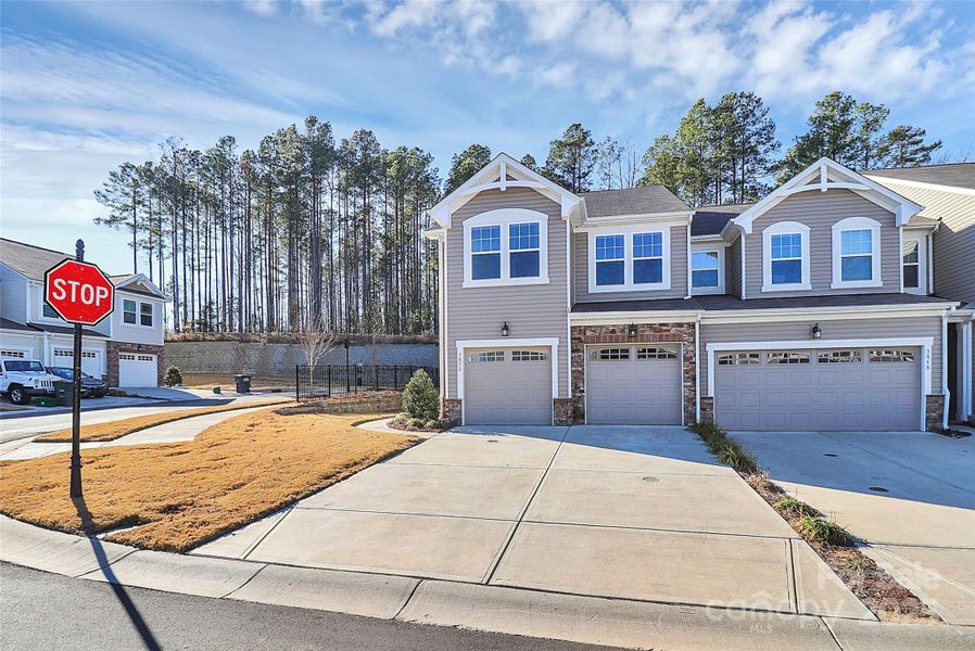 Front exterior of a new home in Somerset, Fort Mill, SC, highlighting curb appeal (Image 1). Front exterior of a new home in Somerset, Fort Mill, SC, highlighting curb appeal (Image 1).