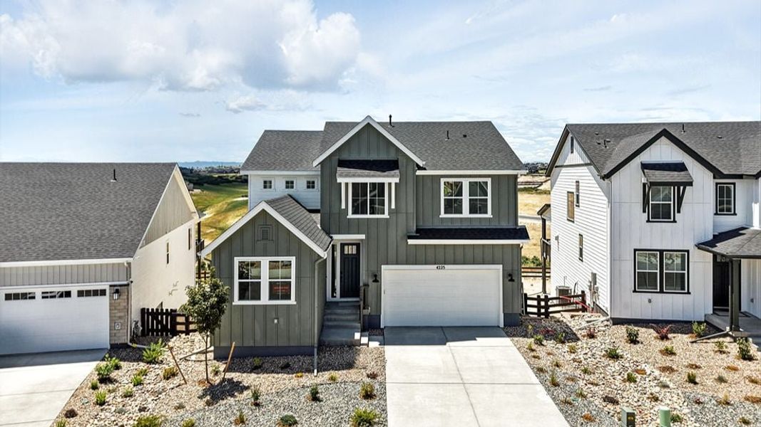 Representative exterior photo of a completed home built from the Palisade by Taylor Morrison in Macanta City Collection, Castle Rock, CO (Image 1).