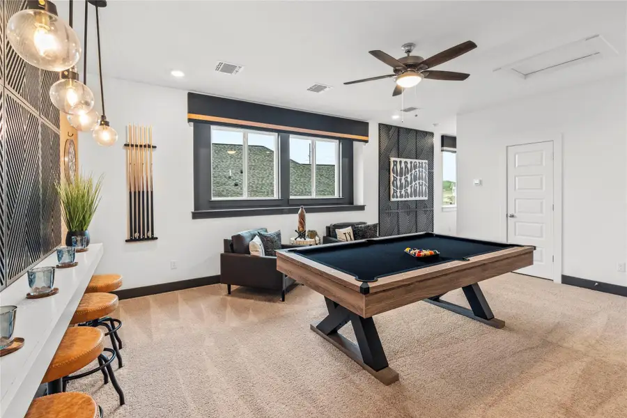 Recreation room featuring carpet, pool table, attic access, recessed lighting, and a ceiling fan
