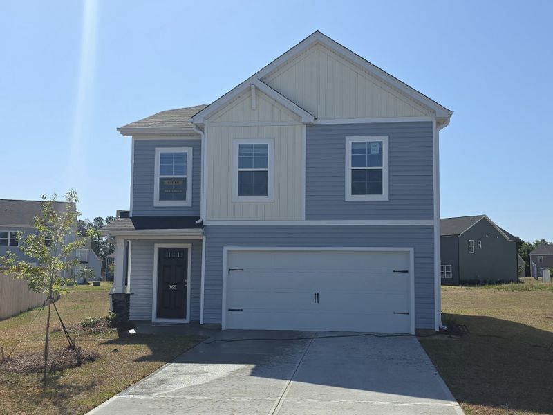 Front exterior of a new home in Rivers Crossing, Aiken, SC, highlighting curb appeal (Image 2). Front exterior of a new home in Rivers Crossing, Aiken, SC, highlighting curb appeal (Image 2).