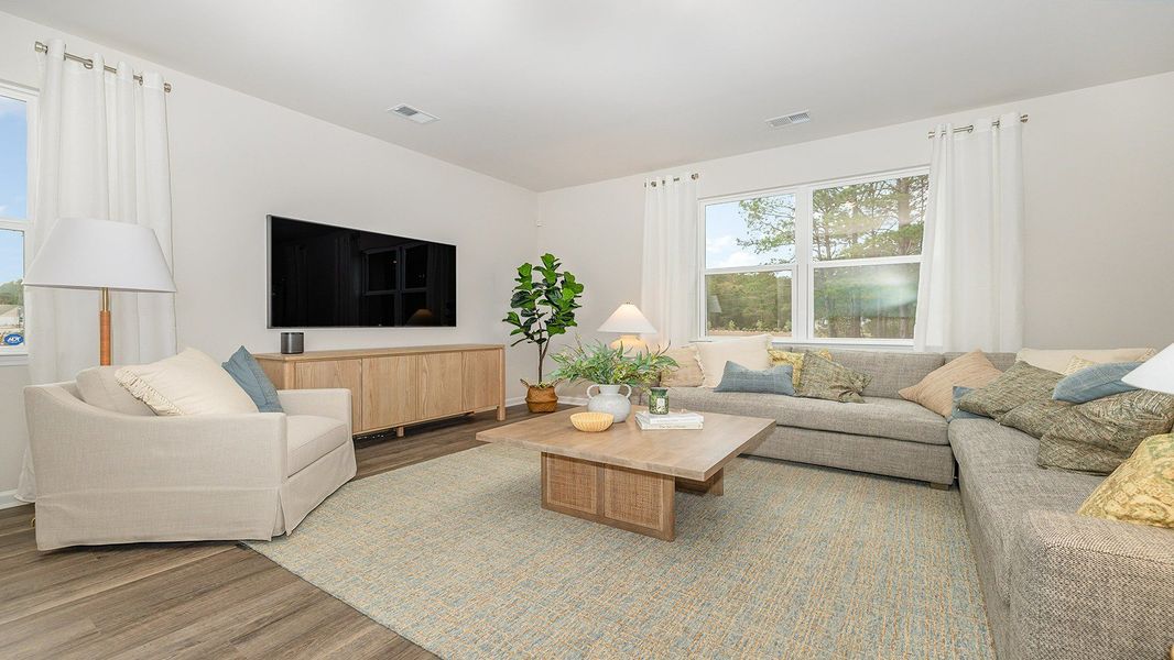 Representative furnished interior of a home built from the Galen by D.R. Horton in Sandridge Park, Little River (Image 5).