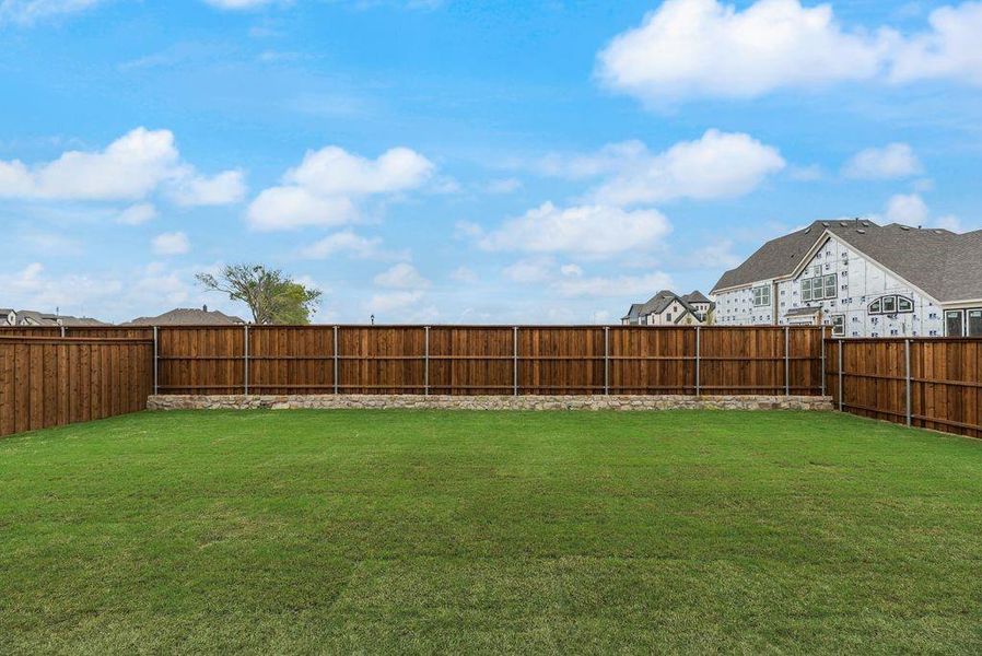 Exterior details and patio area of a home in Grand Estates of Anna, Anna (Image 3).