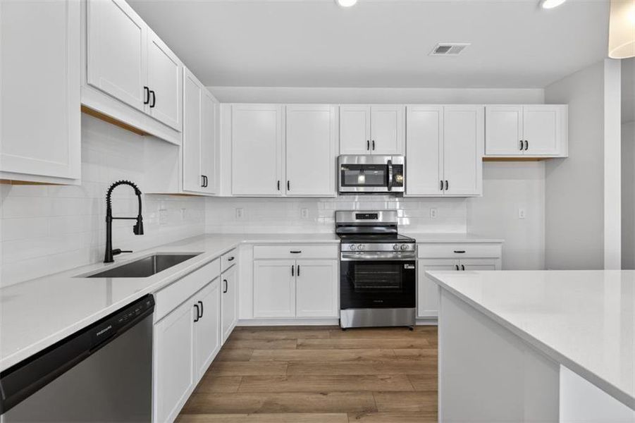 Furnished interior view inside a new home in Sanders Park, Austell (Image 3).