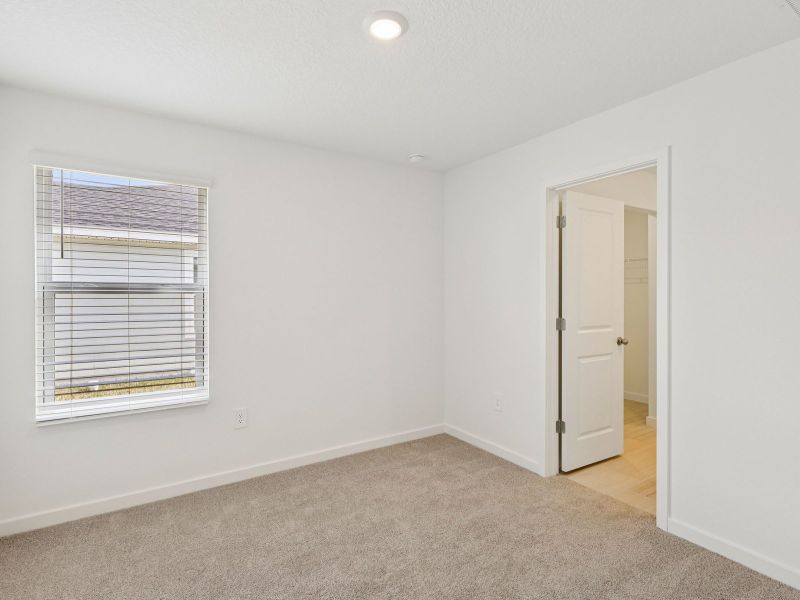 Spacious, unfurnished interior of a new home in Flagler Village - Classic Series, Palm Coast (Image 13).