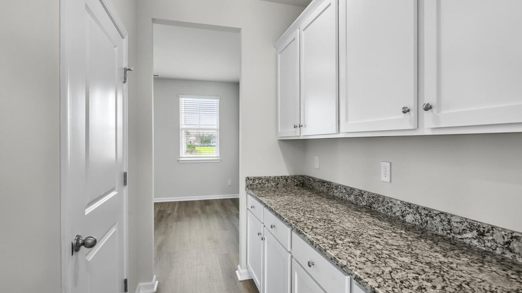 Furnished interior view inside a new home in Magnolia Ridge at Blake Farm, Wilmington (Image 6).