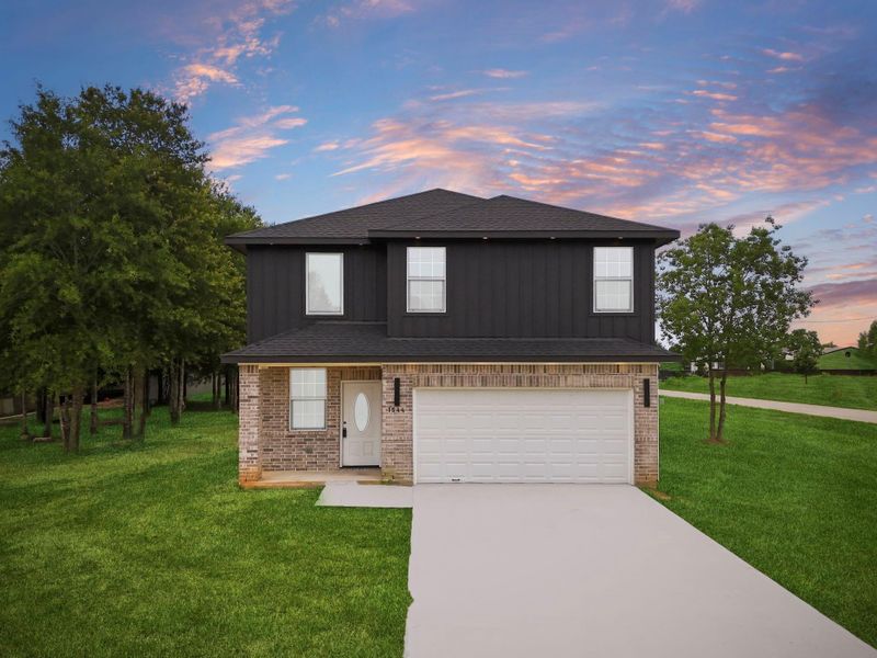 Front exterior of a new home in , Cleveland, TX, highlighting curb appeal (Image 37). Front exterior of a new home in , Cleveland, TX, highlighting curb appeal (Image 37).