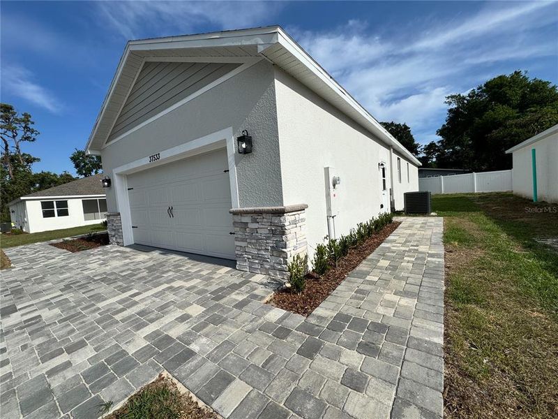 Exterior details and patio area of a home in , Dade City (Image 30).