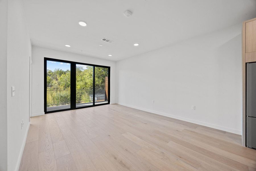 Spacious, unfurnished interior of a new home in One Oak, Austin (Image 14). Spacious, unfurnished interior of a new home in One Oak, Austin (Image 14).