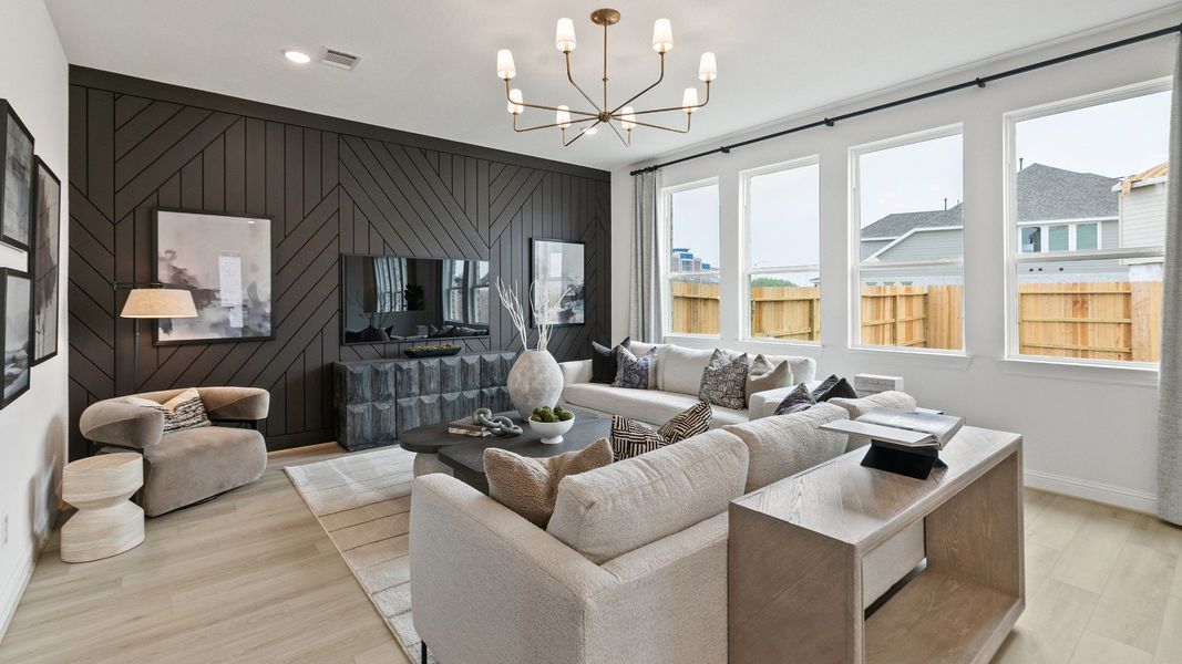 Representative furnished interior of a home built from the Mimosa by Brightland Homes in Sunterra, Katy (Image 8).