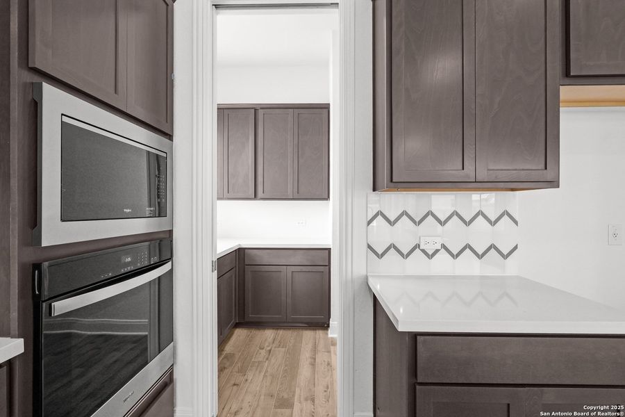 Furnished interior view inside a new home in Megan's Landing, Castroville (Image 4).