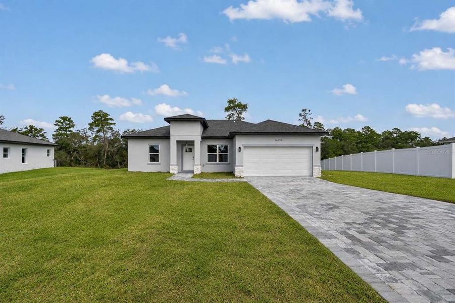 Front exterior of a new home in , Ocala, FL, highlighting curb appeal (Image 21).