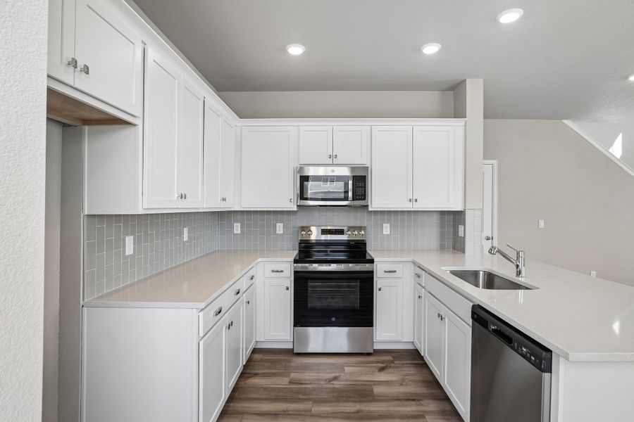 Furnished interior view inside a new home in Windler, Aurora (Image 5).