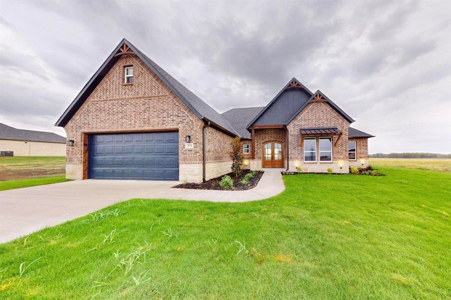 View of front of home with a front yard