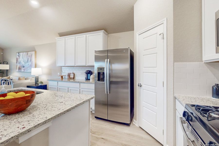 Furnished interior view inside a new home in Agave, San Antonio (Image 15).