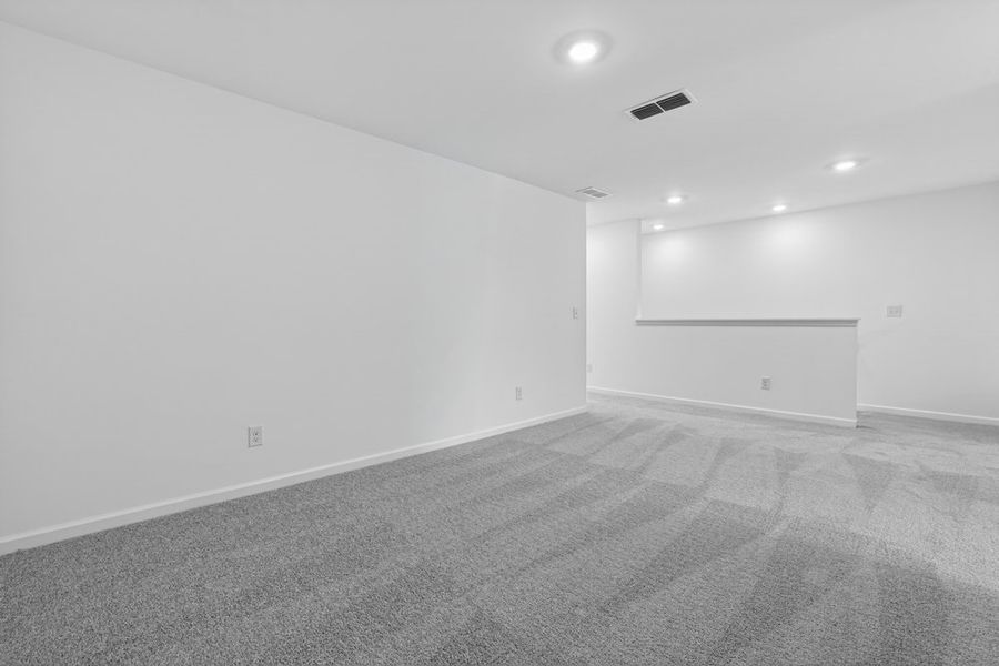 Spacious, unfurnished interior of a new home in Weatherfield, Buford (Image 24).