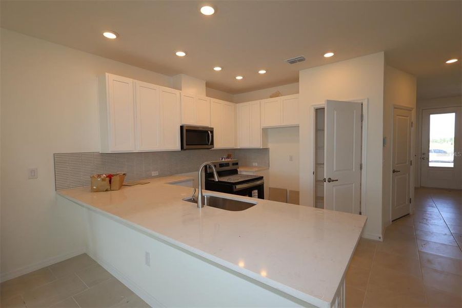 Furnished interior view inside a new home in , Apollo Beach (Image 4).