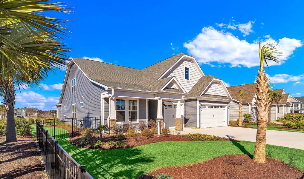Representative exterior photo of a completed home built from the The Surfrider by Chesapeake Homes in Bridgewater - Shorehaven Village, Little River, SC (Image 2). Representative exterior photo of a completed home built from the The Surfrider by Chesapeake Homes in Bridgewater - Shorehaven Village, Little River, SC (Image 2).