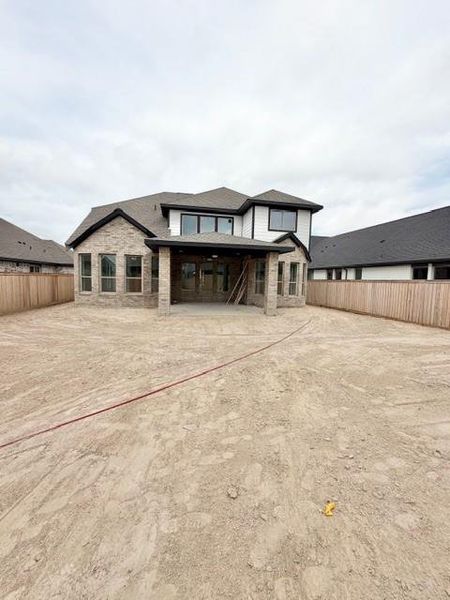 Exterior details and patio area of a home in Bridgeland, Cypress (Image 3).