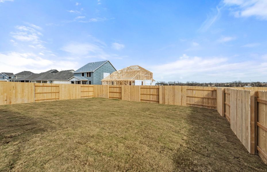 Exterior details and patio area of a home in Patterson Ranch, Georgetown (Image 25).