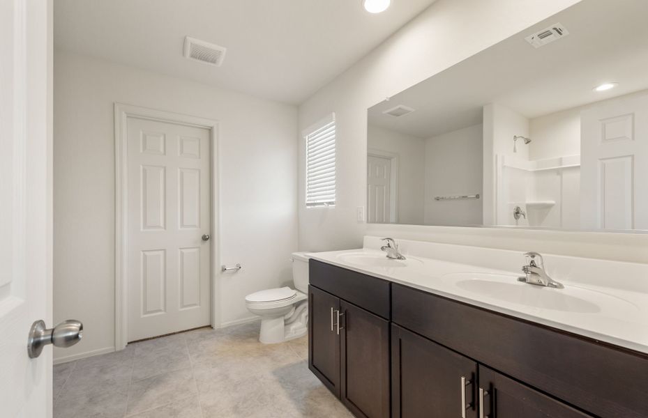 Furnished interior view inside a new home in Entrada La Coraza at Rancho Sahuarita, Sahuarita (Image 9).