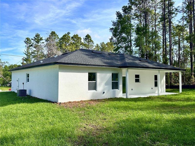 Front exterior of a new home in , Citrus Springs, FL, highlighting curb appeal (Image 16). Front exterior of a new home in , Citrus Springs, FL, highlighting curb appeal (Image 16).