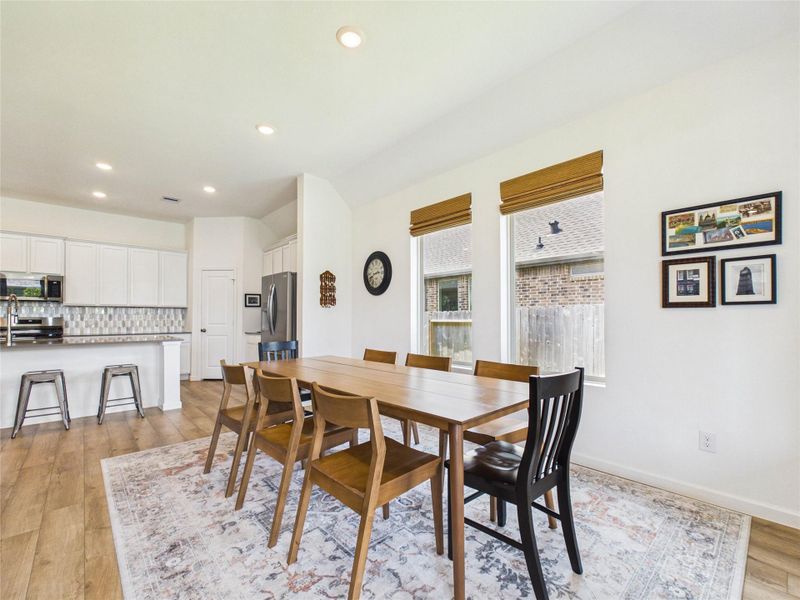 Entertaining is easy with the dining area open to the kitchen, creating a seamless flow for gathering, serving, and everyday meals.