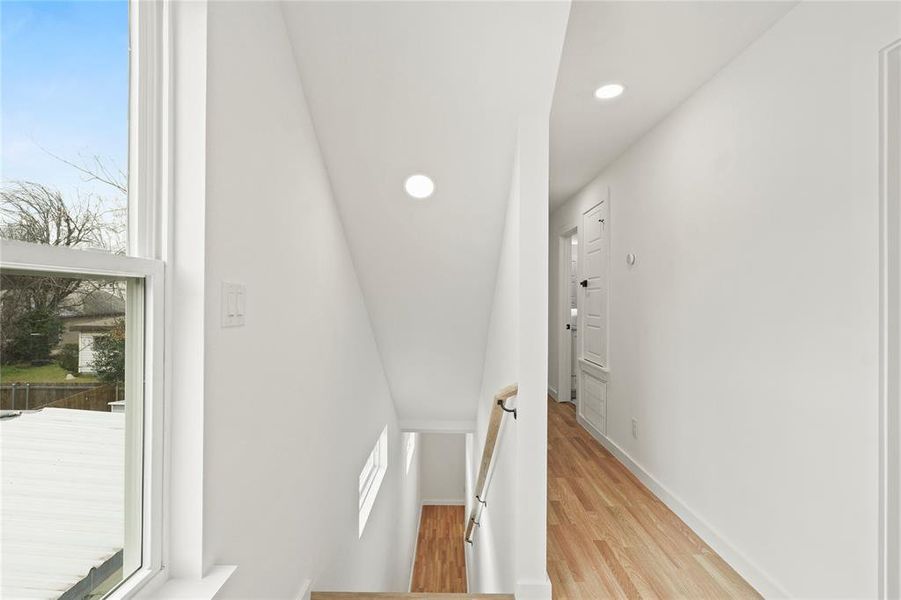 Hallway featuring light hardwood / wood-style floors