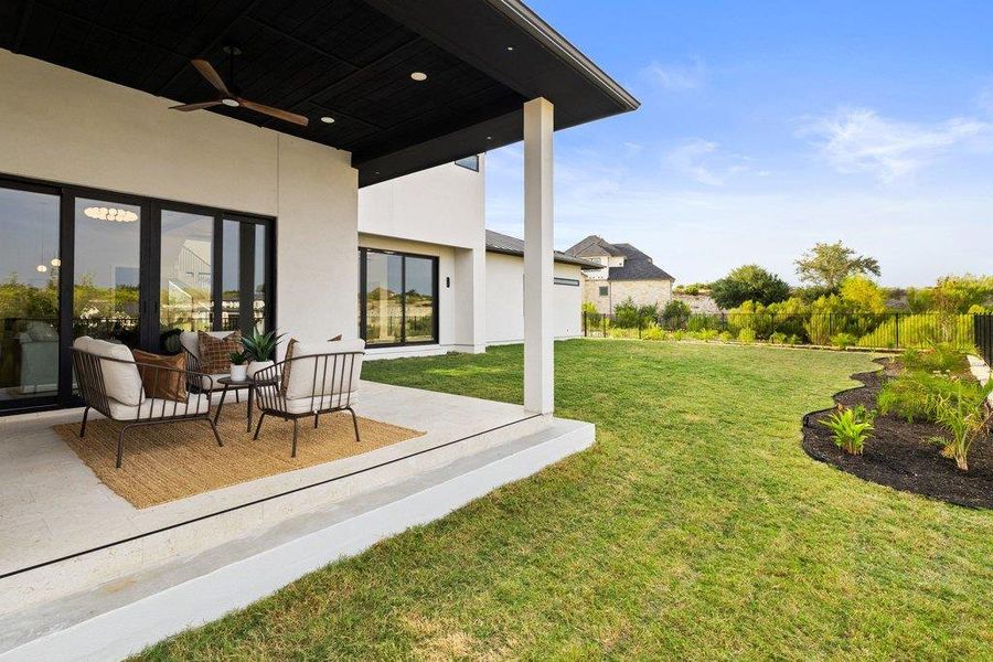 Exterior details and patio area of a home in , Leander (Image 3). Exterior details and patio area of a home in , Leander (Image 3).