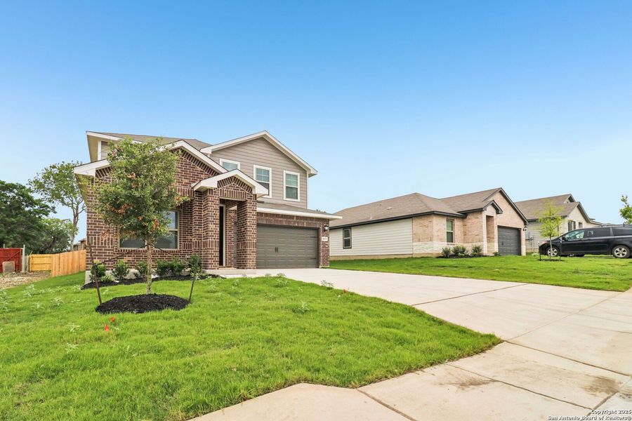 Front exterior of a new home in Royal Crest, San Antonio, TX, highlighting curb appeal (Image 29). Front exterior of a new home in Royal Crest, San Antonio, TX, highlighting curb appeal (Image 29).