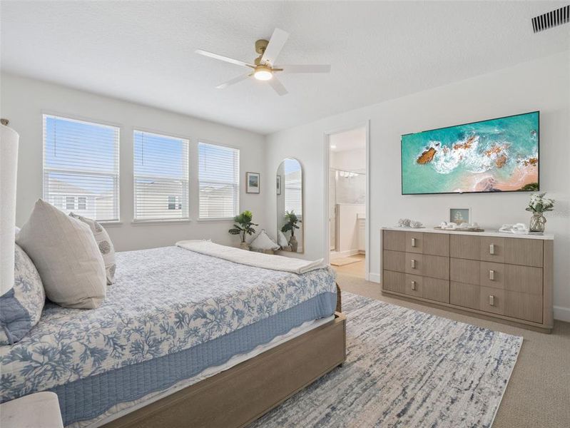 Furnished interior view inside a new home in Harvest at Ovation, Winter Garden (Image 18).