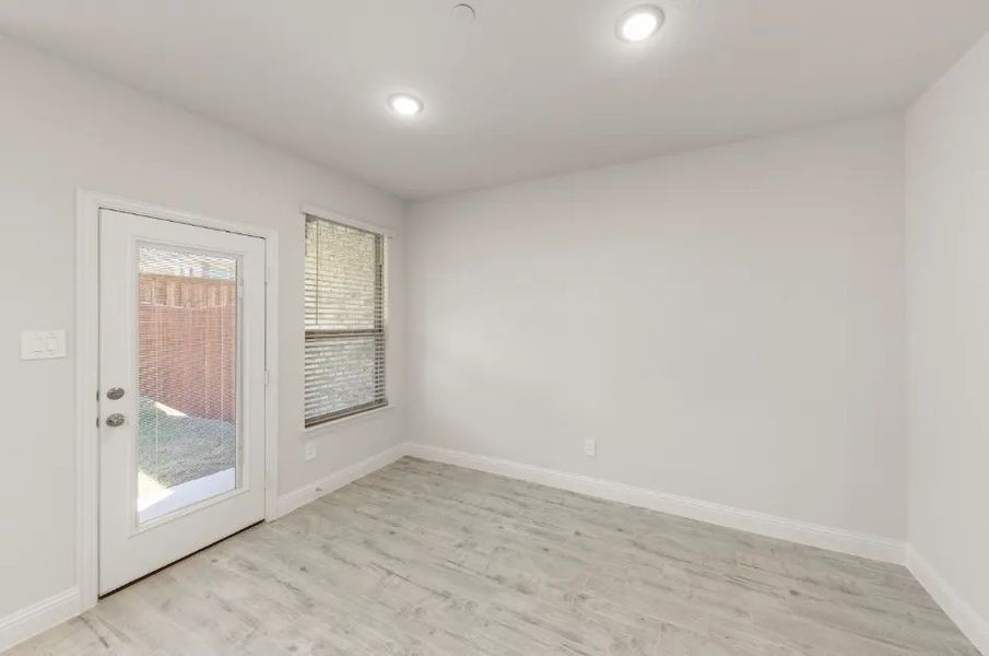 Front exterior of a new home in Sereno Oaks at Buckner Terrace, Dallas, TX, highlighting curb appeal (Image 17).