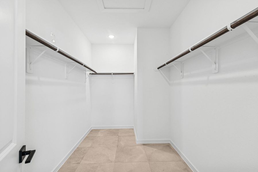 Primary walk-in closet (*Photo not of actual home and used for illustration purposes only.)