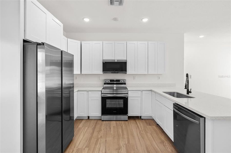 Furnished interior view inside a new home in , Okeechobee (Image 7).