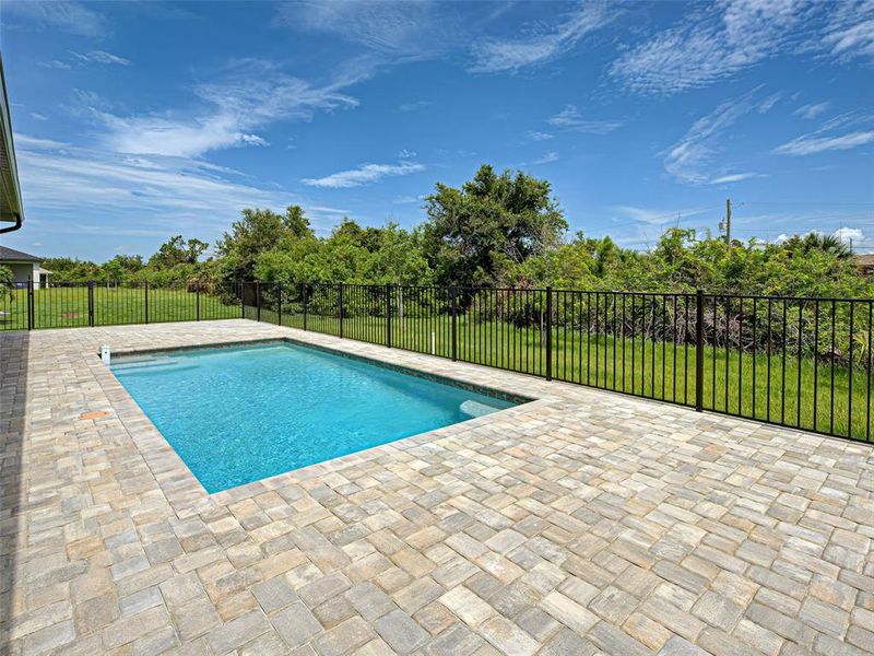 Exterior details and patio area of a home in , Port Charlotte (Image 20).