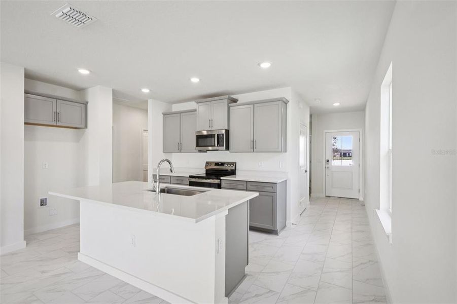 Furnished interior view inside a new home in Grasslands West, Lakeland (Image 5).