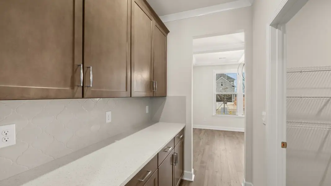 Representative furnished interior of a home built from the Hampshire by D.R. Horton in Heritage Pointe, Senoia (Image 10).