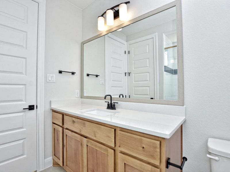 Representative furnished interior of a home built from the Santa Barbara II by Giddens Homes in Scofield Farms Estates, Georgetown (Image 84).