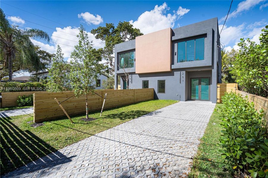 Front exterior of a new home in , Miami, FL, highlighting curb appeal (Image 28).