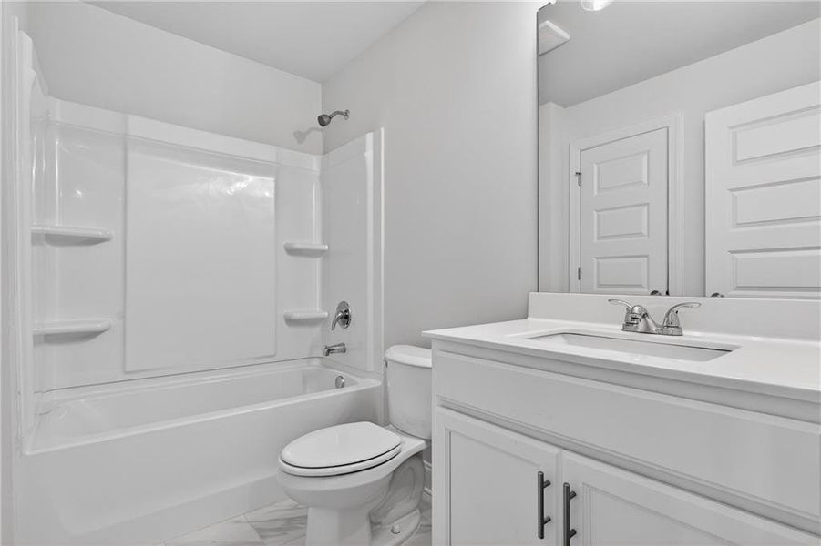 Furnished interior view inside a new home in Waters Edge, Mansfield (Image 5).